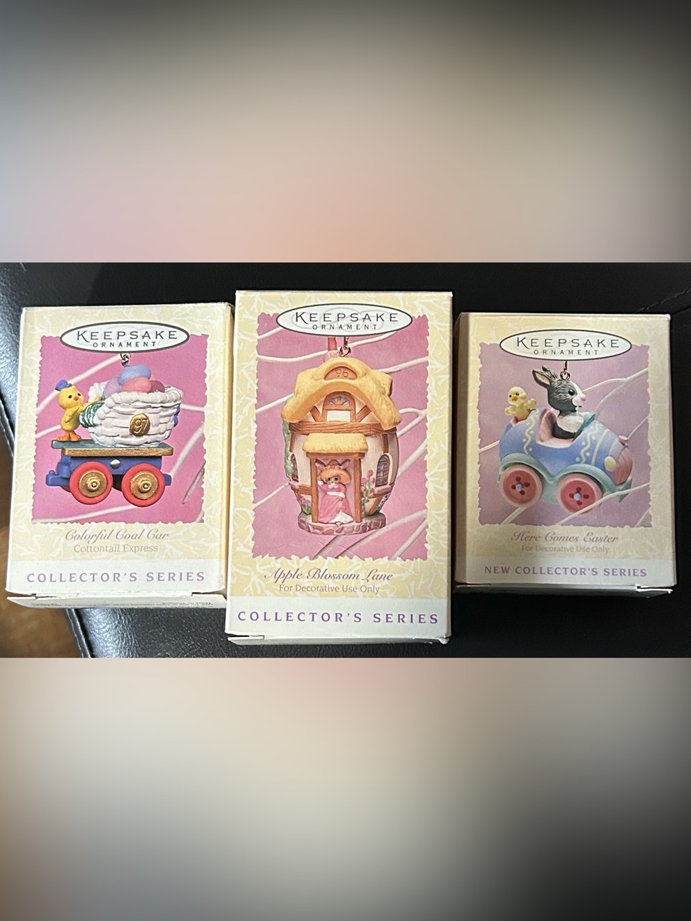 3- Hallmark,ornaments.Coal car 1997, Apple Blossom 1996, Here comes Easter 1994